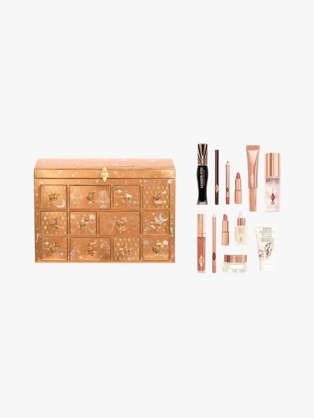 Charlotte Tilbury Charlottes Beauty Treasure Chest in branded components on a light gray background